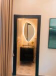 A stylish and unique cool mirror from LightMirror enhancing home decor.