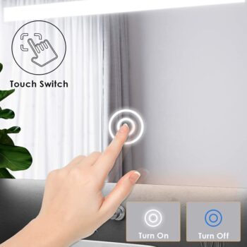 Touch sensor light mirrors in a modern bathroom
