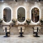 Modern Oval LED Bathroom Mirror with Bluetooth Speaker, Anti-Fog, and Touch-Sensor Lighting