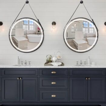 Comparison of metal, wood, and frameless LED mirror frames for home decor.
